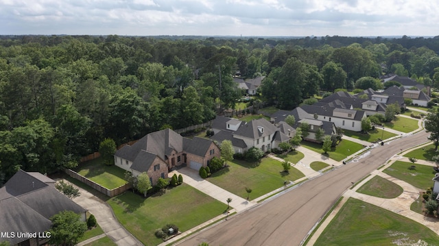 aerial view with a residential view and a forest view