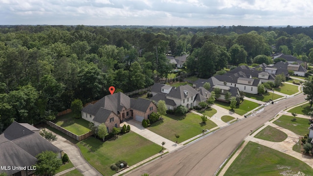 aerial view with a view of trees and a residential view