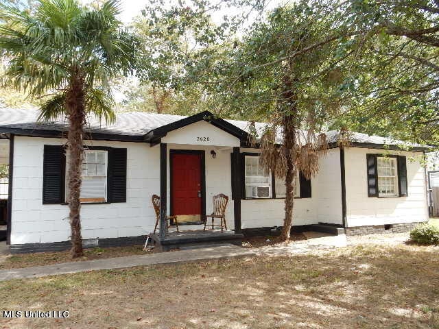 ranch-style house featuring cooling unit