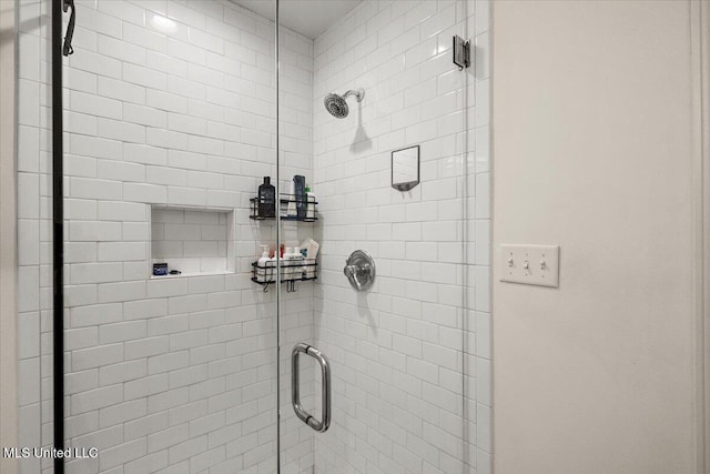 bathroom featuring walk in shower