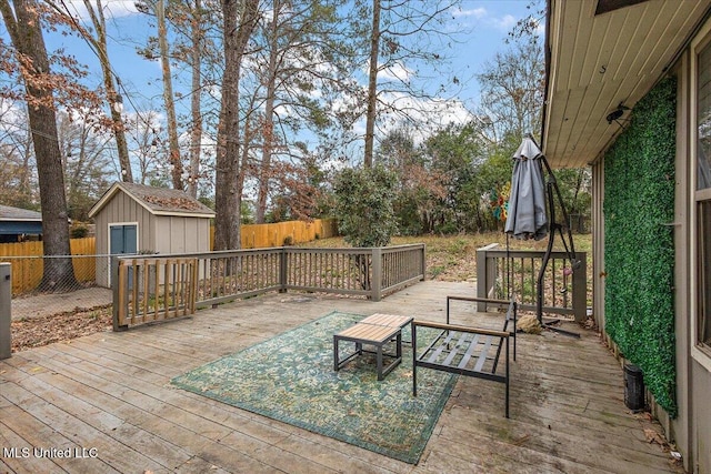 wooden terrace featuring a shed