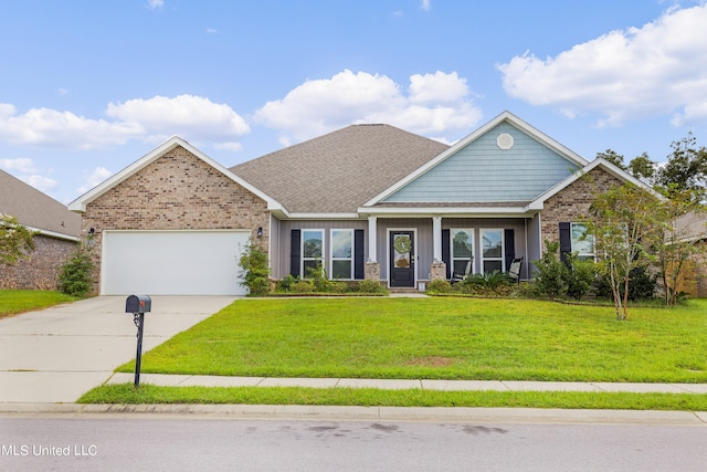 view of front of home featuring a front yard and a garage