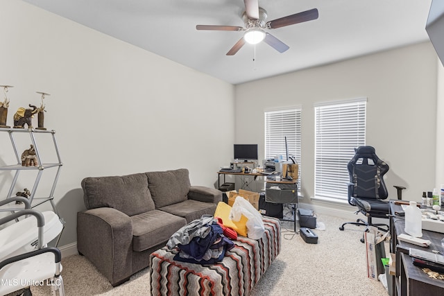 living room with light colored carpet and ceiling fan