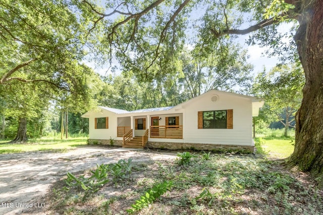 view of front of property featuring covered porch