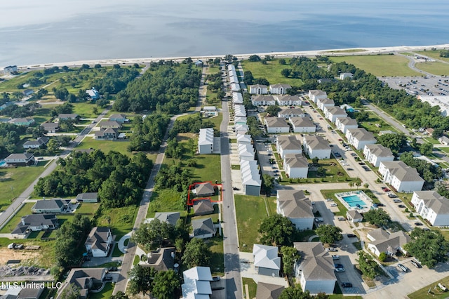 drone / aerial view with a water view