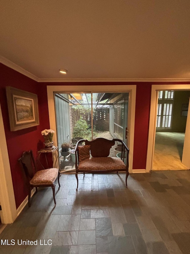 living area with baseboards, recessed lighting, ornamental molding, and wood finished floors