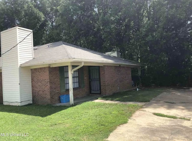 view of property exterior featuring a yard