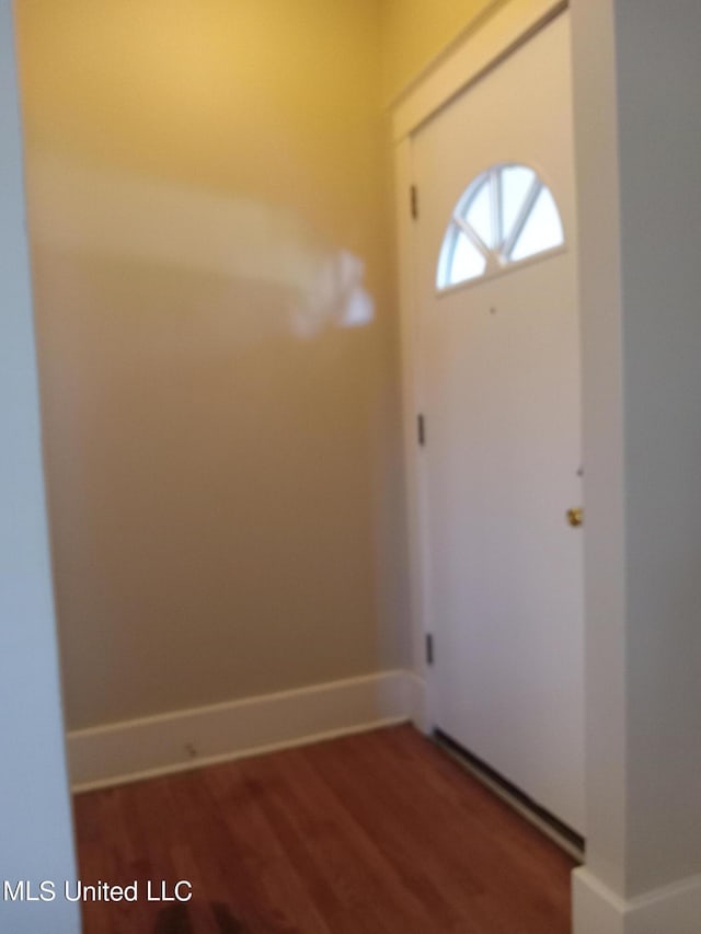 107 E Percy St, Indianola, MS 38751 - entryway with wood finished floors and baseboards