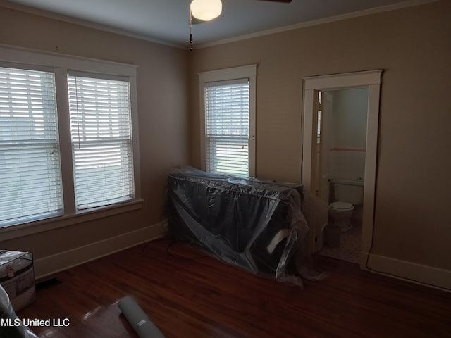 107 E Percy St, Indianola, MS 38751 - bedroom with wood finished floors, ornamental molding, and baseboards