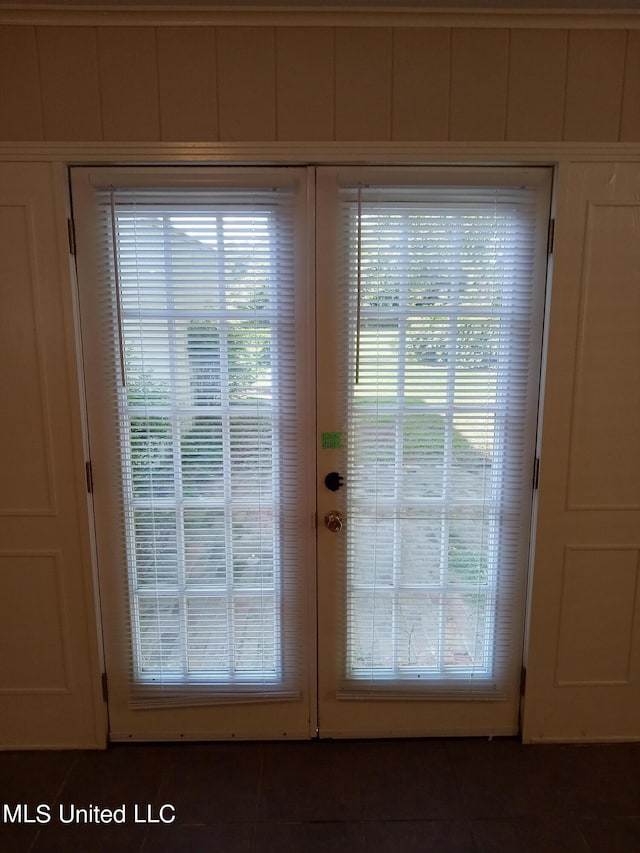 107 E Percy St, Indianola, MS 38751 - doorway to outside featuring dark tile patterned floors