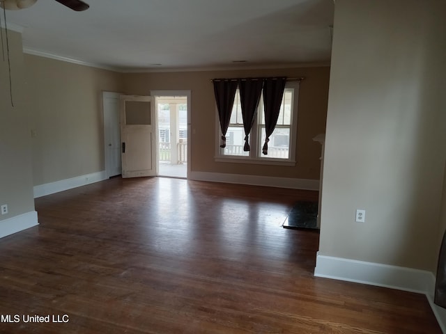 107 E Percy St, Indianola, MS 38751 - empty room featuring ornamental molding, baseboards, wood finished floors, and ceiling fan