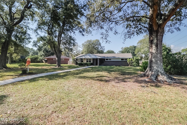 view of front of home with a front yard