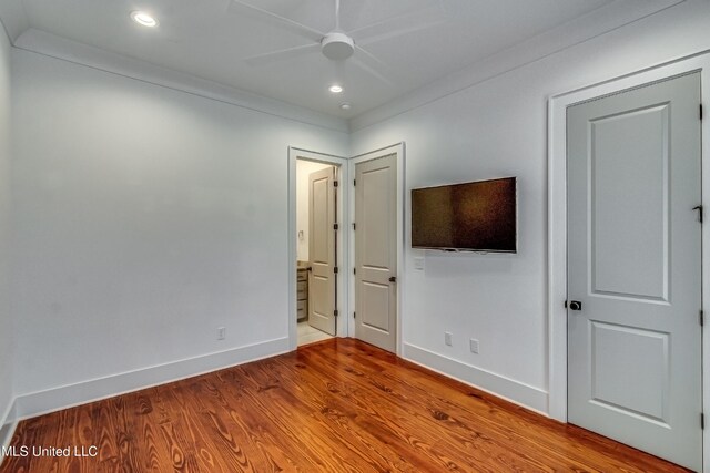 102 Silverleaf Dr, Madison, MS 39110 - unfurnished bedroom featuring wood finished floors, baseboards, ensuite bath, recessed lighting, and a ceiling fan