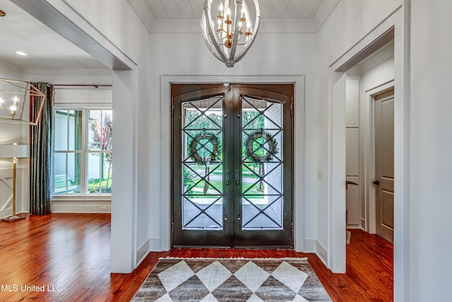 102 Silverleaf Dr, Madison, MS 39110 - foyer entrance featuring a chandelier, wood finished floors, and healthy amount of natural light