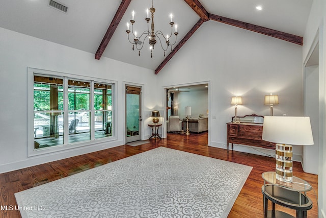 102 Silverleaf Dr, Madison, MS 39110 - living room featuring a chandelier, wood finished floors, beam ceiling, high vaulted ceiling, and baseboards