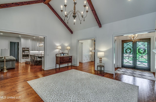 102 Silverleaf Dr, Madison, MS 39110 - entrance foyer featuring a chandelier, french doors, high vaulted ceiling, beam ceiling, and wood finished floors