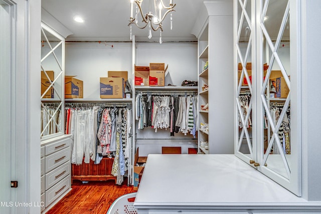 102 Silverleaf Dr, Madison, MS 39110 - walk in closet with wood finished floors and a chandelier