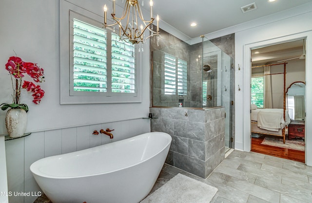 102 Silverleaf Dr, Madison, MS 39110 - bathroom with connected bathroom, plenty of natural light, a shower stall, and a wainscoted wall