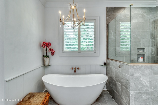 102 Silverleaf Dr, Madison, MS 39110 - bathroom featuring a chandelier, a freestanding bath, tiled shower, and a wainscoted wall