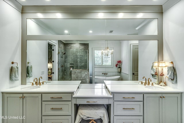 102 Silverleaf Dr, Madison, MS 39110 - full bathroom with a shower stall, a chandelier, vanity, a freestanding tub, and recessed lighting