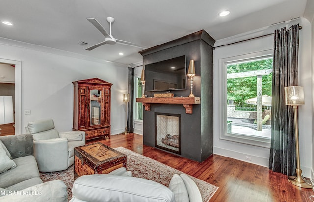 102 Silverleaf Dr, Madison, MS 39110 - living room with a fireplace, ornamental molding, ceiling fan, wood finished floors, and recessed lighting
