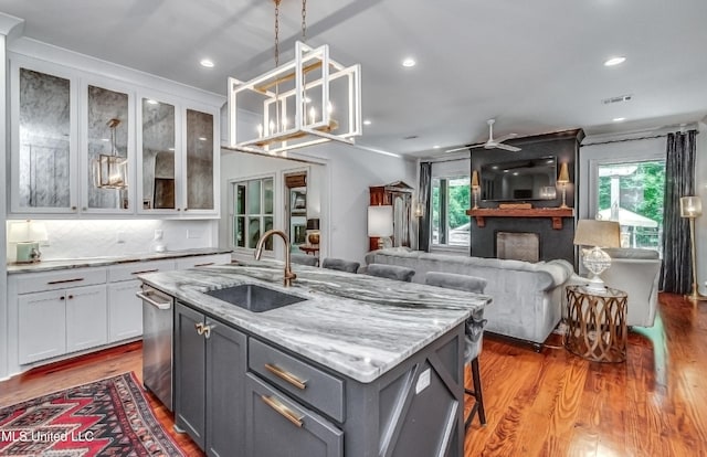 102 Silverleaf Dr, Madison, MS 39110 - kitchen with a sink, healthy amount of natural light, wood finished floors, and recessed lighting