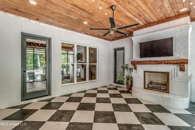 102 Silverleaf Dr, Madison, MS 39110 - unfurnished living room featuring wooden ceiling, ceiling fan, and a fireplace