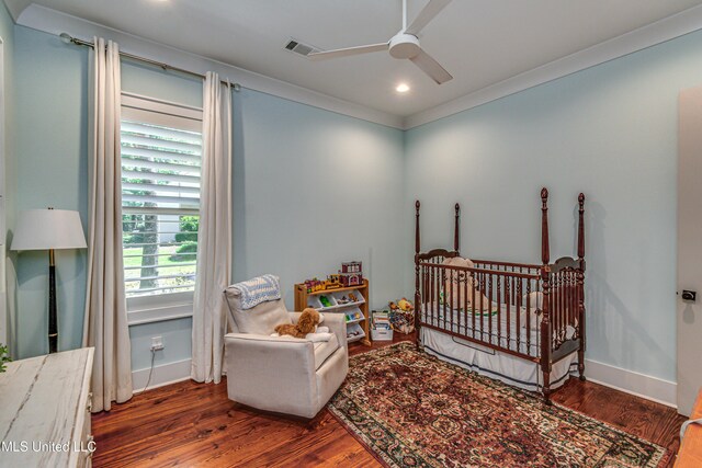 102 Silverleaf Dr, Madison, MS 39110 - bedroom featuring wood finished floors, a crib, baseboards, crown molding, and recessed lighting
