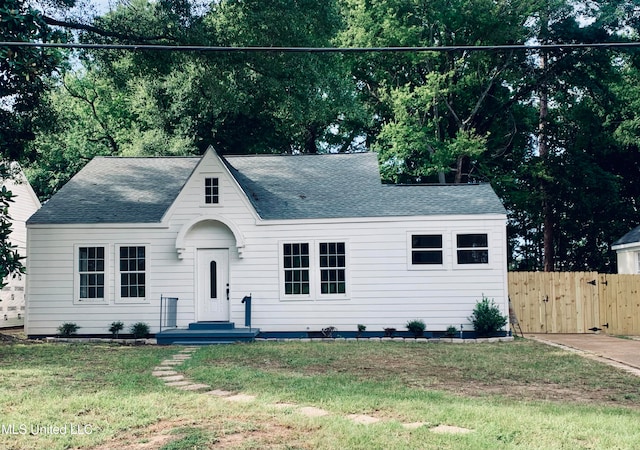 view of front of home with a front yard