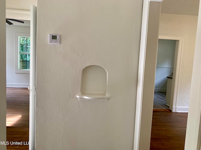 interior details with hardwood / wood-style flooring and ceiling fan