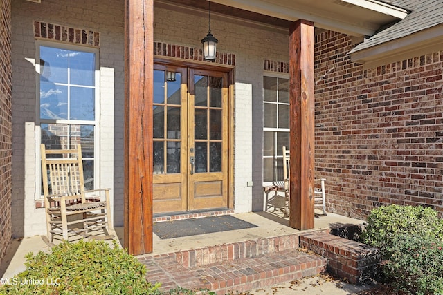 property entrance with french doors and covered porch