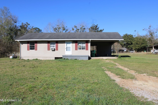 view of front of home with a carport, a front yard, cooling unit, and driveway