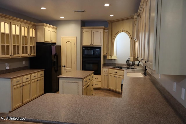 2212 Sampras Blvd, Vancleave, MS 39565 - kitchen with black appliances, recessed lighting, a kitchen island, a peninsula, and glass insert cabinets