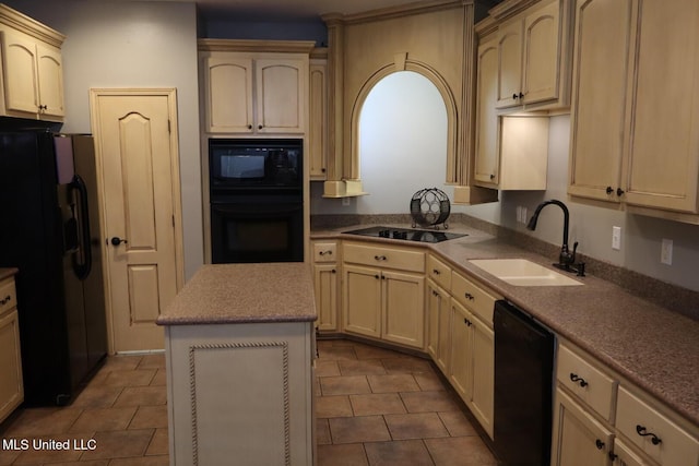 2212 Sampras Blvd, Vancleave, MS 39565 - kitchen featuring black appliances, a kitchen island, dark tile patterned flooring, and cream cabinets