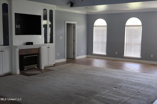 2212 Sampras Blvd, Vancleave, MS 39565 - unfurnished living room with crown molding, tile patterned flooring, and a tile fireplace