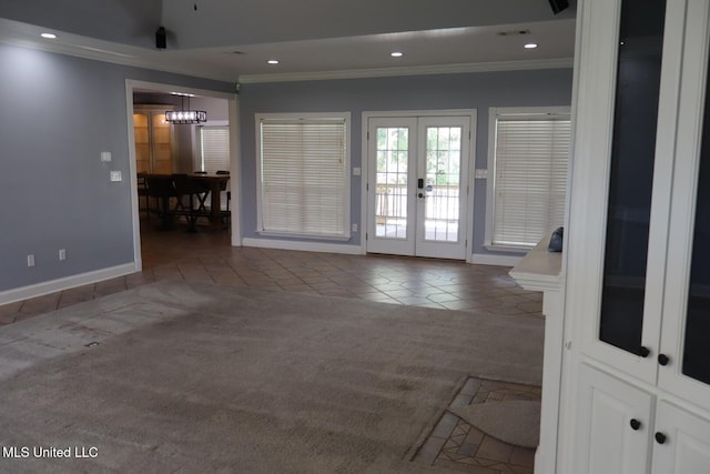 2212 Sampras Blvd, Vancleave, MS 39565 - spare room featuring french doors, crown molding, tile patterned flooring, carpet, and recessed lighting