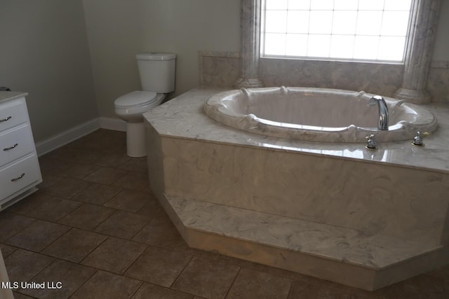 2212 Sampras Blvd, Vancleave, MS 39565 - bathroom featuring vanity, a bath, tile patterned floors, and ornate columns