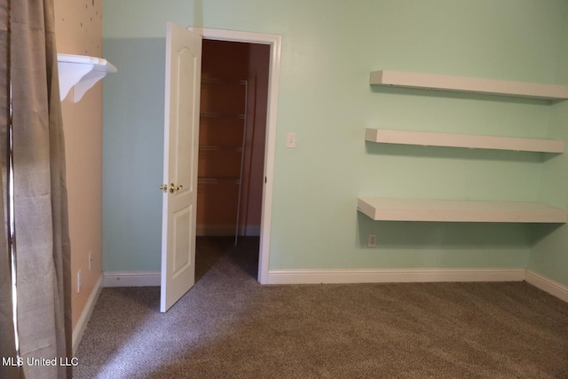2212 Sampras Blvd, Vancleave, MS 39565 - unfurnished bedroom featuring carpet flooring and baseboards