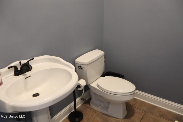 2212 Sampras Blvd, Vancleave, MS 39565 - bathroom with a sink and tile patterned flooring