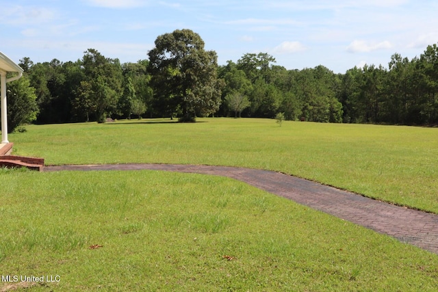 2212 Sampras Blvd, Vancleave, MS 39565 - view of property's community featuring a lawn