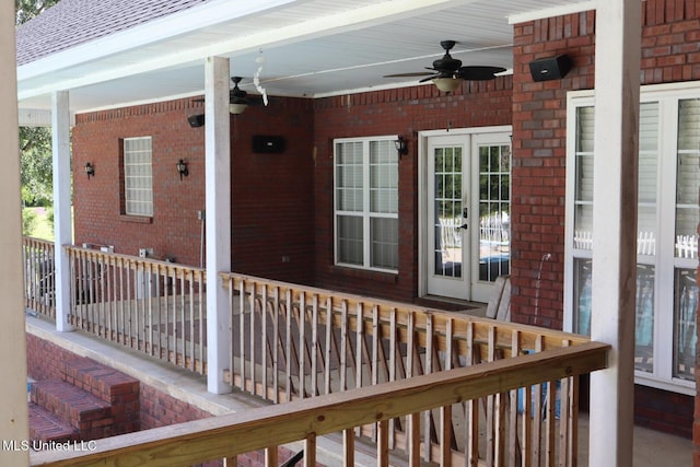 2212 Sampras Blvd, Vancleave, MS 39565 - doorway to property with ceiling fan, brick siding, and a porch