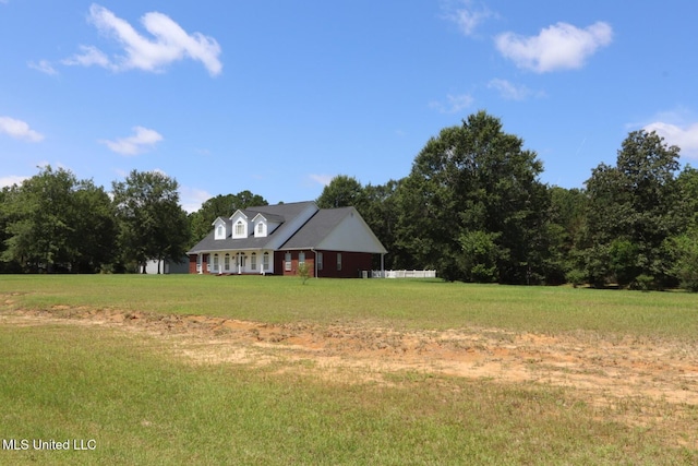2212 Sampras Blvd, Vancleave, MS 39565 - cape cod home with a front lawn