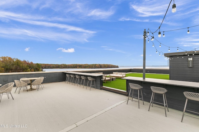 view of patio featuring a bar