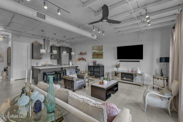 living room featuring ceiling fan