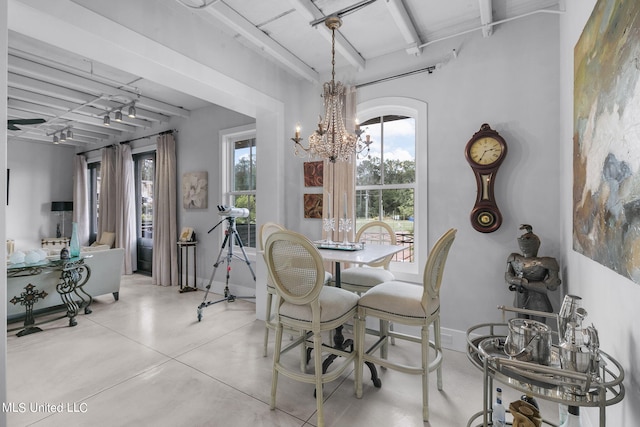 dining space featuring a chandelier