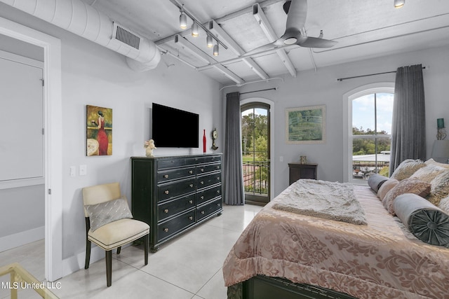 bedroom featuring ceiling fan and access to exterior