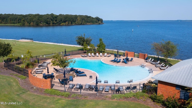 view of pool featuring a water view and a patio area