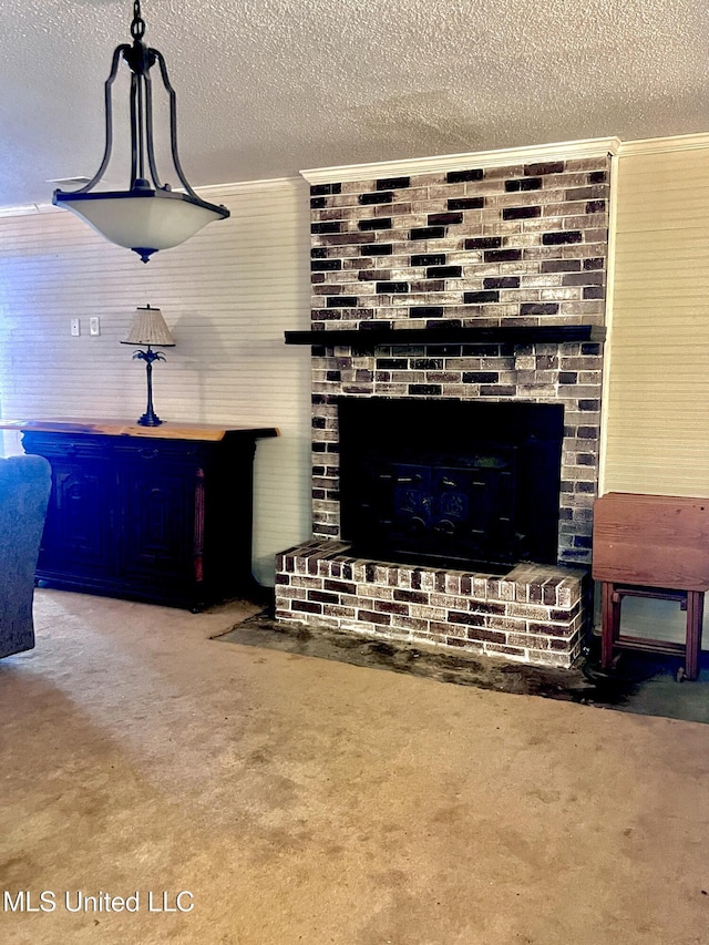 116 E Tate St, Senatobia, MS 38668 - living area featuring a brick fireplace, carpet floors, crown molding, and a textured ceiling