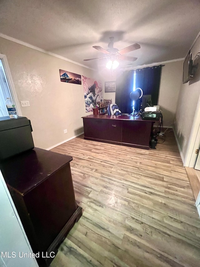 116 E Tate St, Senatobia, MS 38668 - office space with baseboards, crown molding, wood finished floors, and ceiling fan