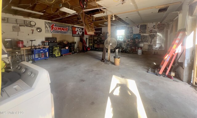 116 E Tate St, Senatobia, MS 38668 - garage featuring washer / dryer